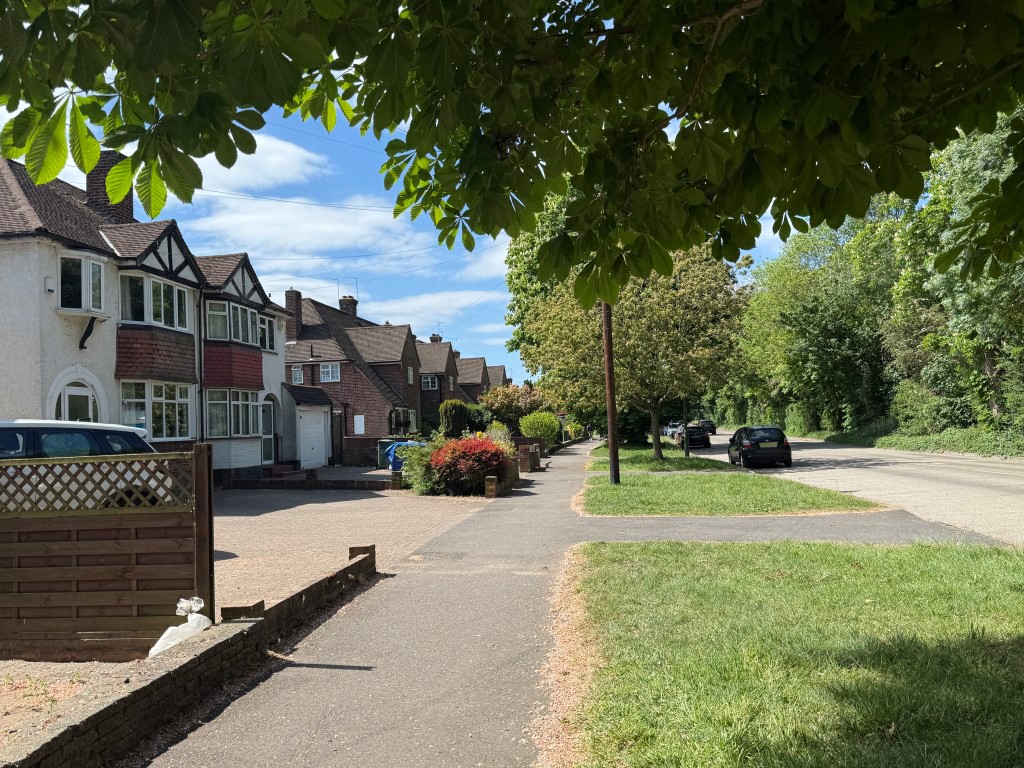 Lot: 9 - A COMPOUND OF TEN GARAGES WITH POTENTIAL - Street scene in front of ten garages